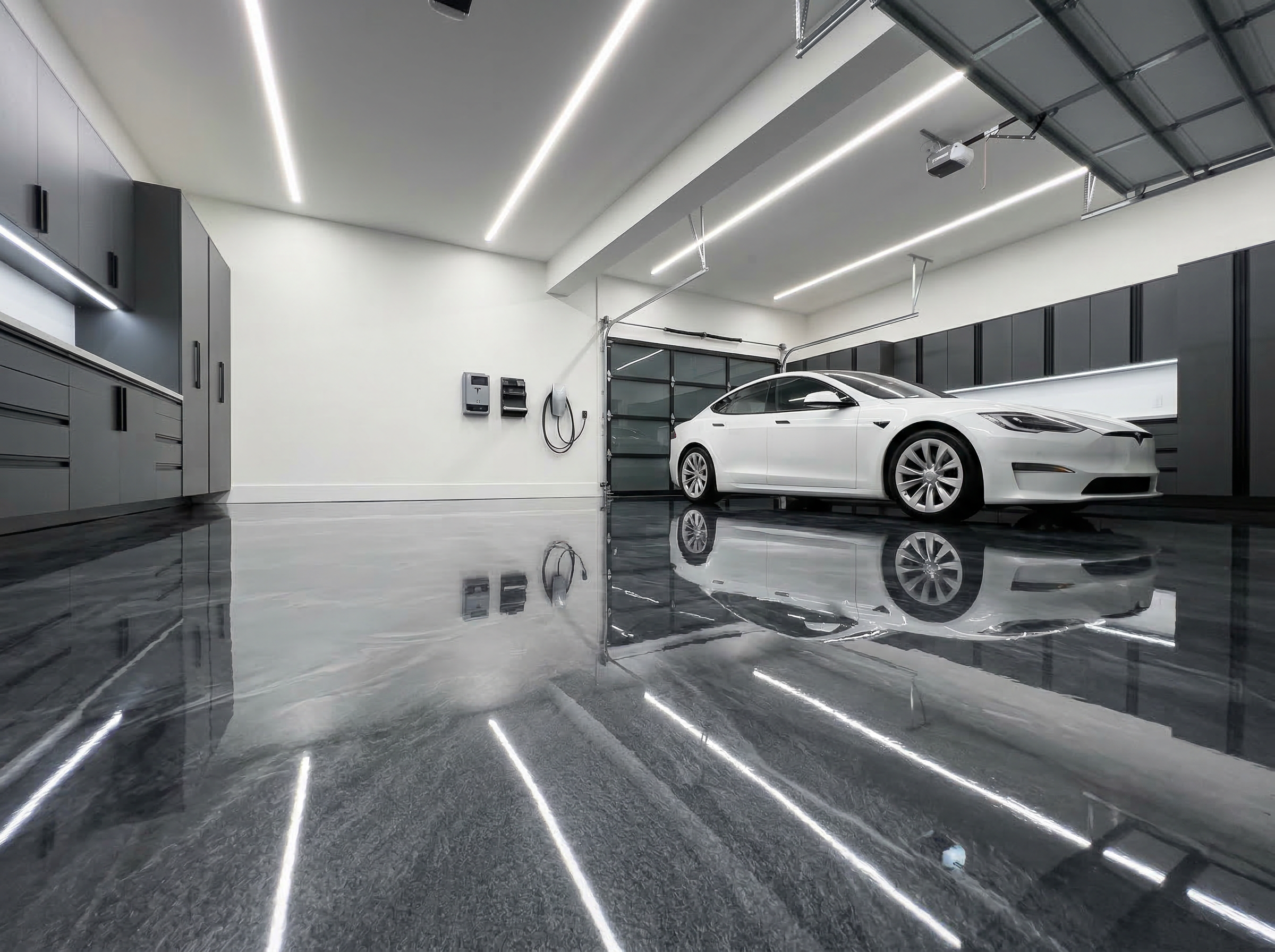 High-gloss epoxy garage floor coating in a luxury home
